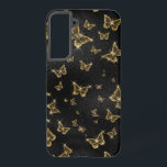 Coque Samsung Galaxy Motif de glam or et papillons noirs<br><div class="desc">Des papillons noir et or glam dans un motif sans soudure. Design luxueux moderne avec étincelles blanches.</div>