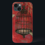 Etui iPhone 13 Cage d'oiseaux décorative avec papillons<br><div class="desc">Deux papillons pâles planent autour d'une cage d'oiseaux dans ce tableau de Norman Wyatt. Les feuilles pendent au-dessus de la cage à oiseaux,  et tout repose sur un arrière - plan pourri. Commandez cette impression dès aujourd'hui !</div>