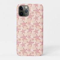 Étoiles de mer et motif pastel rose corail