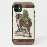 Le renard rustique sur un tronc d'arbre