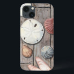 iPhone 13 Case Les trésors marins<br><div class="desc">Megan Meagher est connue pour ses oeuvres d'art simples. Cette image montre la simplicité des trésors du bord de mer, dont les dollars de sable et les coquillages dans un ton pastel. Meagher embrasse à son image un arrière - plan en bois pour contraster ces trésors. Obtenez cette impression fine...</div>
