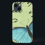 Etui iPhone 13 Papillon à ailes bleues sur carte postale Turquois<br><div class="desc">Cette carte postale turquoise porte un message de beauté. Un délicat papillon à ailes bleues repose sur la carte,  obscurcissant une partie du script qu'il contient. Cette impression de Vision Studio ferait un grand ajout à votre maison!</div>