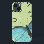 Etui iPhone 13 Papillon à ailes bleues sur carte postale Turquois<br><div class="desc">Cette carte postale turquoise porte un message de beauté. Un délicat papillon à ailes bleues repose sur la carte,  obscurcissant une partie du script qu'il contient. Cette impression de Vision Studio ferait un grand ajout à votre maison!</div>