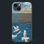 iPhone 13 Coque Three White Seagulls Flying Over the Water<br><div class="desc">Need to get away? Do it by choosing this painting by artist Tara Friel representing three seagulls flying over the water. The sight of the waves of the ocean and the vivid colors make this design very realistic.</div>