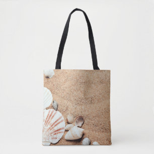 Coquillages et sac fourre-tout à sable
