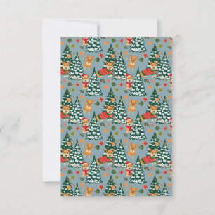 Corgis décorent l'arbre de Noël en forêt