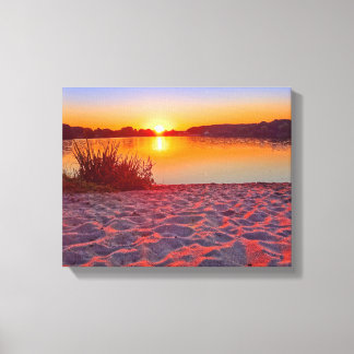 Coucher de soleil rose sur la toile de plage envel