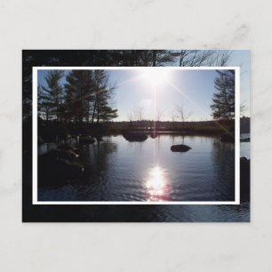 Coucher de soleil sur la carte postale du lac