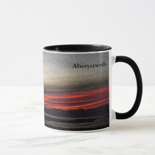 Coucher de soleil sur la mer à Aberystwyth mug