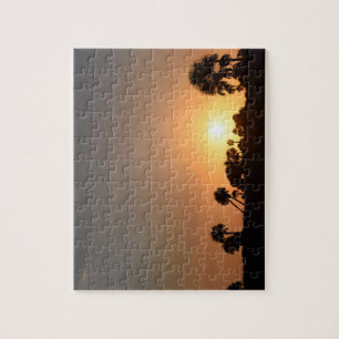 Coucher du soleil sur le puzzle de plage