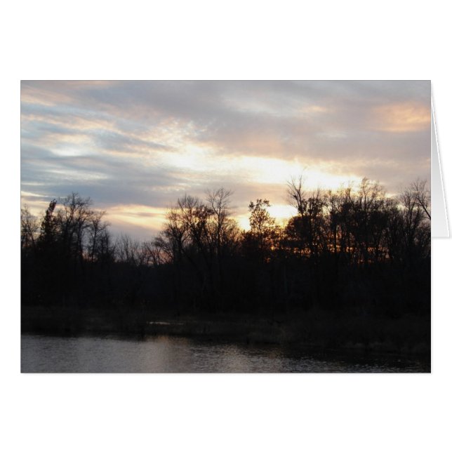 Coucher du soleil sur les eaux arrières du fleuve  (Devant horizontal)