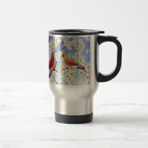 Couples cardinaux dans la tasse de voyage de