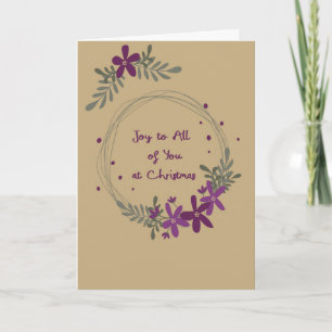 Couronne de carte de Noël avec des fleurs violette