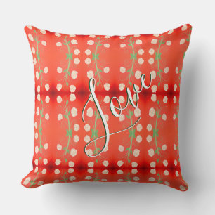 Coussin à fleurs rouges