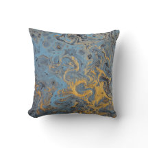 Coussin abstrait de bleu et d'or
