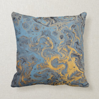 Coussin abstrait de bleu et d'or