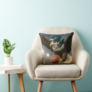 Coussin Aigle avec un ballon de football dans un stade spo