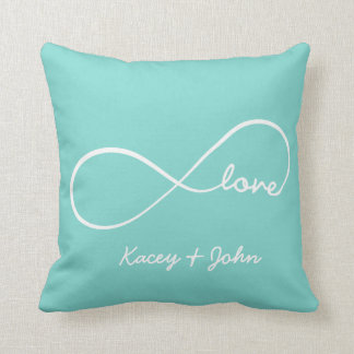 Coussin Amour d'infini avec l'arrière - plan de Quatrefoil