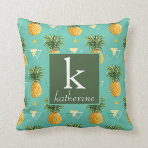 Coussin Ananas lumineux sur le monogramme géométrique du