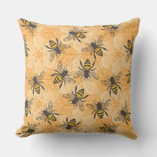 Coussin apricot fleuri de la ruche miel orange