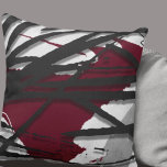 Coussin Aquarelle Abstraite bordeaux et noire<br><div class="desc">L'oreiller à jetons moderne présente un design artistique élégant dans une palette de couleurs noir et gris bordeaux. Cette composition artistique est construite à partir d'un design de bloc de bois artistique, superposé sur des éléments de design de style Memphis; des éléments de design en couches créent des tons clairs...</div>