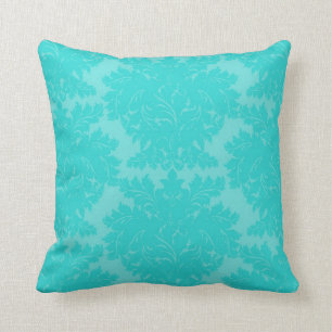 Coussin audacieux motif damassé bleu aqua