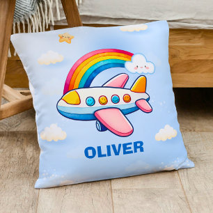 Coussin Avion de ligne passager fantaisiste avec arc-en-ci
