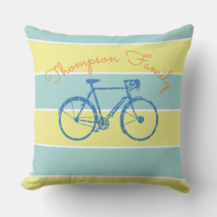Coussin bandes bleues et jaunes avec vélo, famille