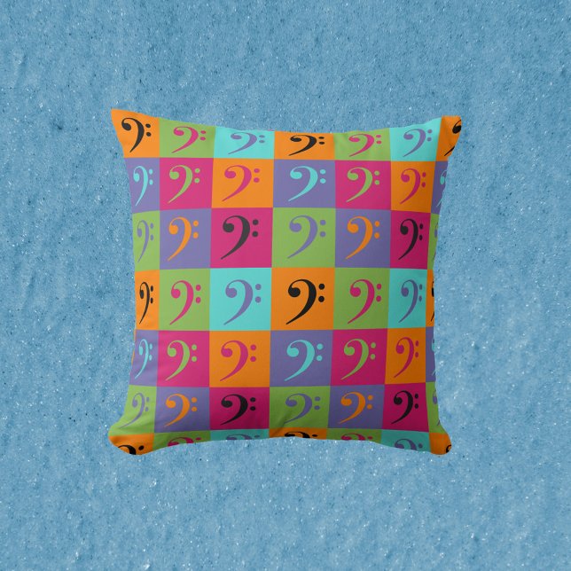 Coussin Bass Clef Motif de musique orange rose violet (A pillow with a fun and colorful bass clef pattern.)