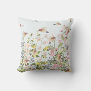 Coussin Beau colibri dans le jardin fleuri