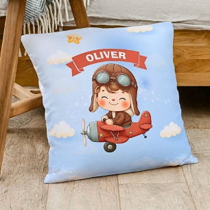 Coussin Bébé Aviateur Rêveur dans un Avion Rouge