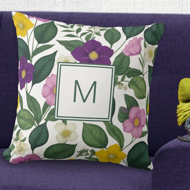 Coussin Belle impression florale élégante Fleurs de printe (A pretty monogrammed cushion with purple, pink, yellow and white flowers and green leaves)