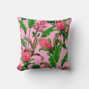 Coussin Belles feuilles vertes tropicales avec fleurs roug