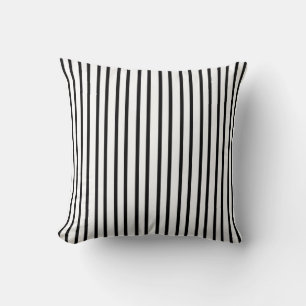 Coussin blanc avec des rayures noires
