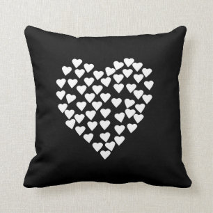 Coussin Blanc de coeur de coeurs sur le noir