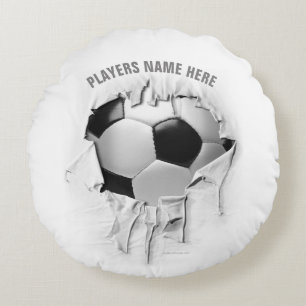 Coussin blanc rond de football déchiré