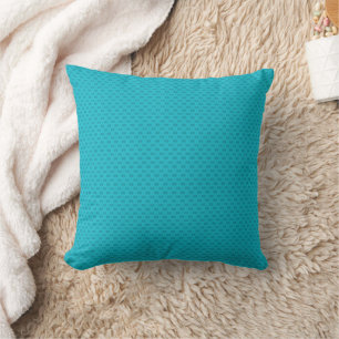 Coussin Bleu lumineux néon texturé.