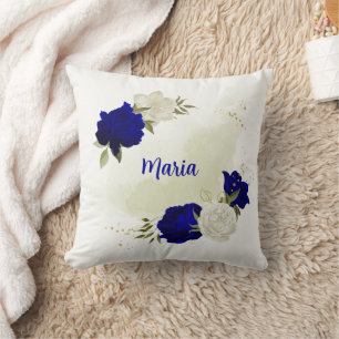 Coussin bleu royal fleurs blanches feuilles vertes