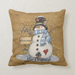Coussin Bonhomme de neige d'art populaire sur le vieux