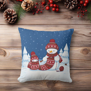 Coussin Bonhomme de neige tricotant une écharpe de Noël