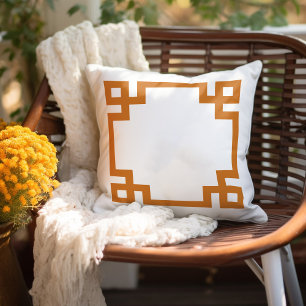 Coussin Bordure de clé grecque blanche et orange brûlée