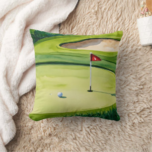 Coussin Boule de golf et drapeau sur la mise en vert