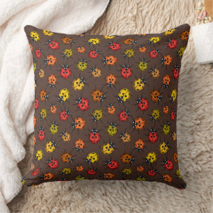 Coussin Bugs colorés sur brun