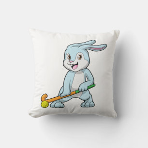 Coussin Bunny au hockey sur gazon avec bâton de hockey