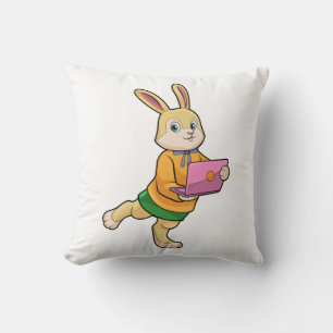 Coussin Bunny comme secrétaire avec ordinateur portable