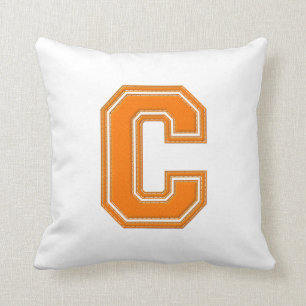 Coussin C de carreau de lettre, orange et blanc collégial