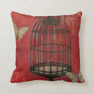 Coussin Cage à oiseaux décorative avec des papillons
