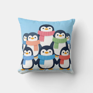 Coussin Câlins de manchots mignons avec des écharpes d'hiv