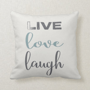 Coussin Carreau vivant de la typographie   de rire d'amour