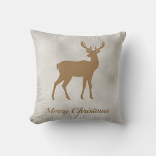 Coussin Cerf de forme brun doré sur texture de velours syn